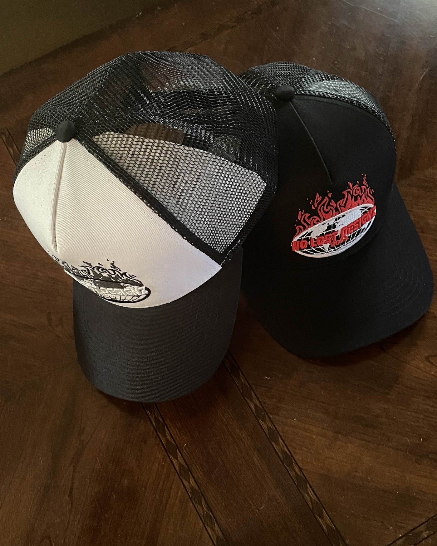 Level up your fit – the EST 2023 Trucker Hat brings streetwear energy + everyday comfort. Grab yours today 
Black and white , Front , lift , right 