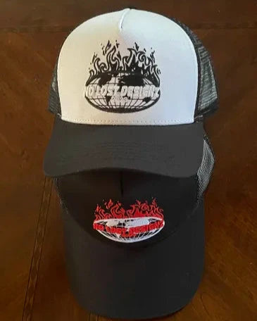 Stay cool. Stay bold. Stay fresh. The EST 2023 Trucker Hat is your go-to style upgrade
Black and white ,
Front 